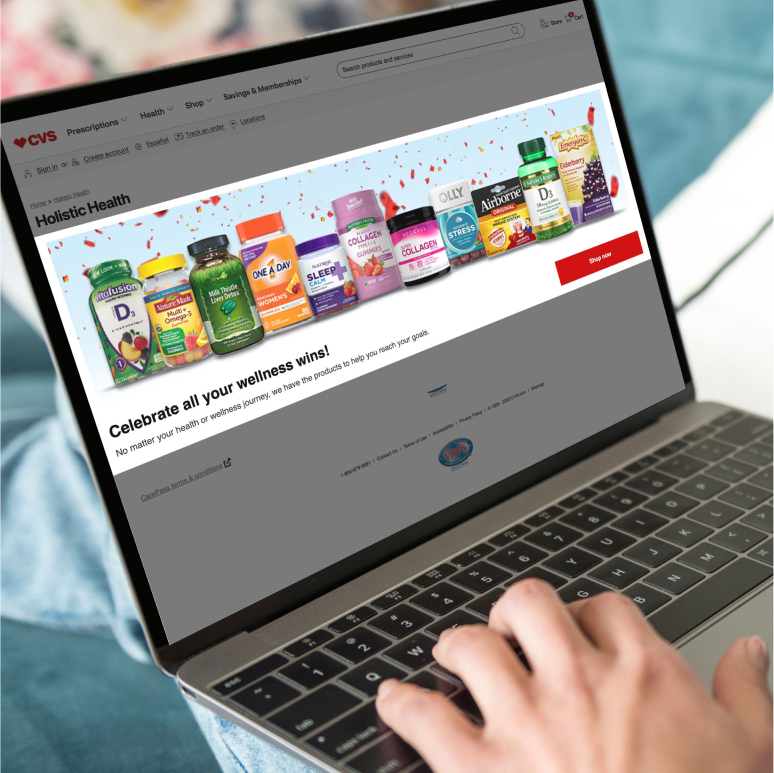 Laptop displaying an ad for vitamins and supplements